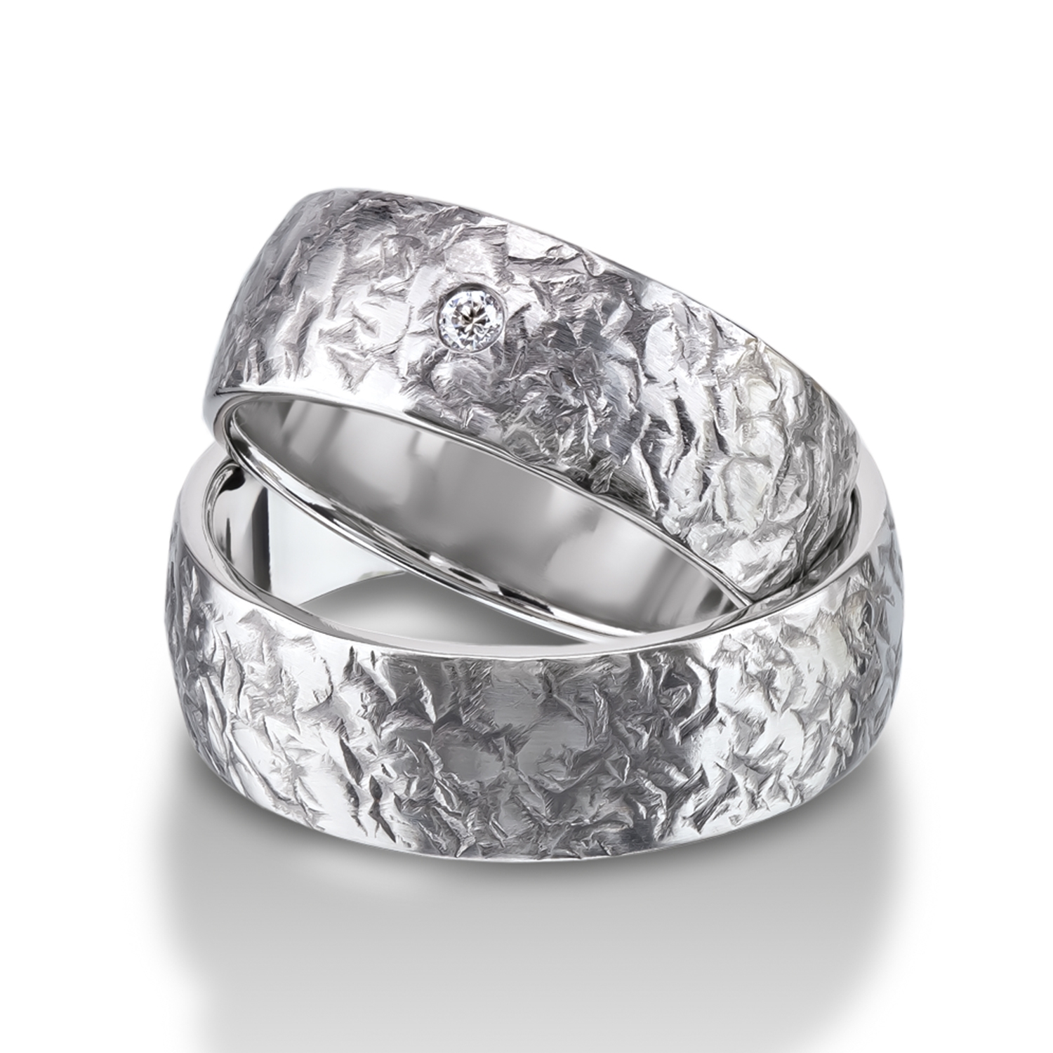 Rings in gold, platinum and palladium with diamonds Furrer Jacot