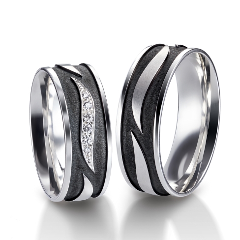 Rings in gold, platinum, palladium and black with diamonds Furrer Jacot
